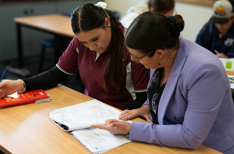 teacher assisting in english